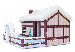  Do kupienia brązowy domek dmuchana chatka świętego mikołaja z dachem pokrytym śniegiem, z wnętrzem do dowolnej aranżacji. Zamów online dmuchane obiekty dekoracyjne od producenta JB Dmuchance