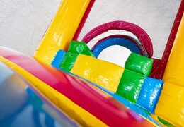 Mini dmuchany zamek multiplay z motywem flaminga ze zjeżdżalnią dla dzieci. Zamów nadmuchiwane dmuchane zamki online w JB Dmuchańce Polska