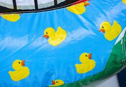 Opblaasbaar luchtkussen met glijbaan in summer party thema bestellen voor kinderen