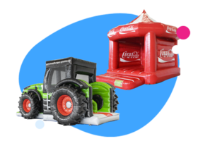 Zdjęcie nadmuchiwanej zamczysko i traktora