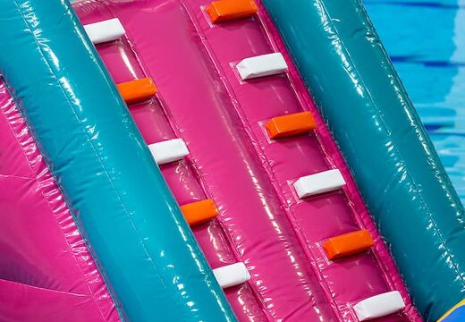 Opblaasbare waterstormbaan huren in flamingo thema voor kinderen