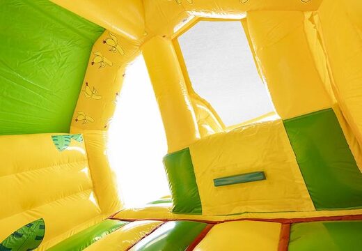 Bestel opblaasbaar luchtkussen met glijbaan in bananen apen thema