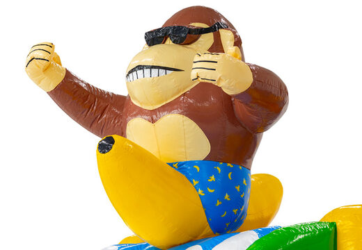 Figura 3D na zamku dmuchanym Dubbelslide małpa z bananem motyw plażowy.