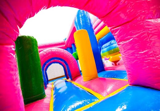 Wnętrze zamku dmuchanego Dubbelslide Multiplay niebiesko-żółto-różowego